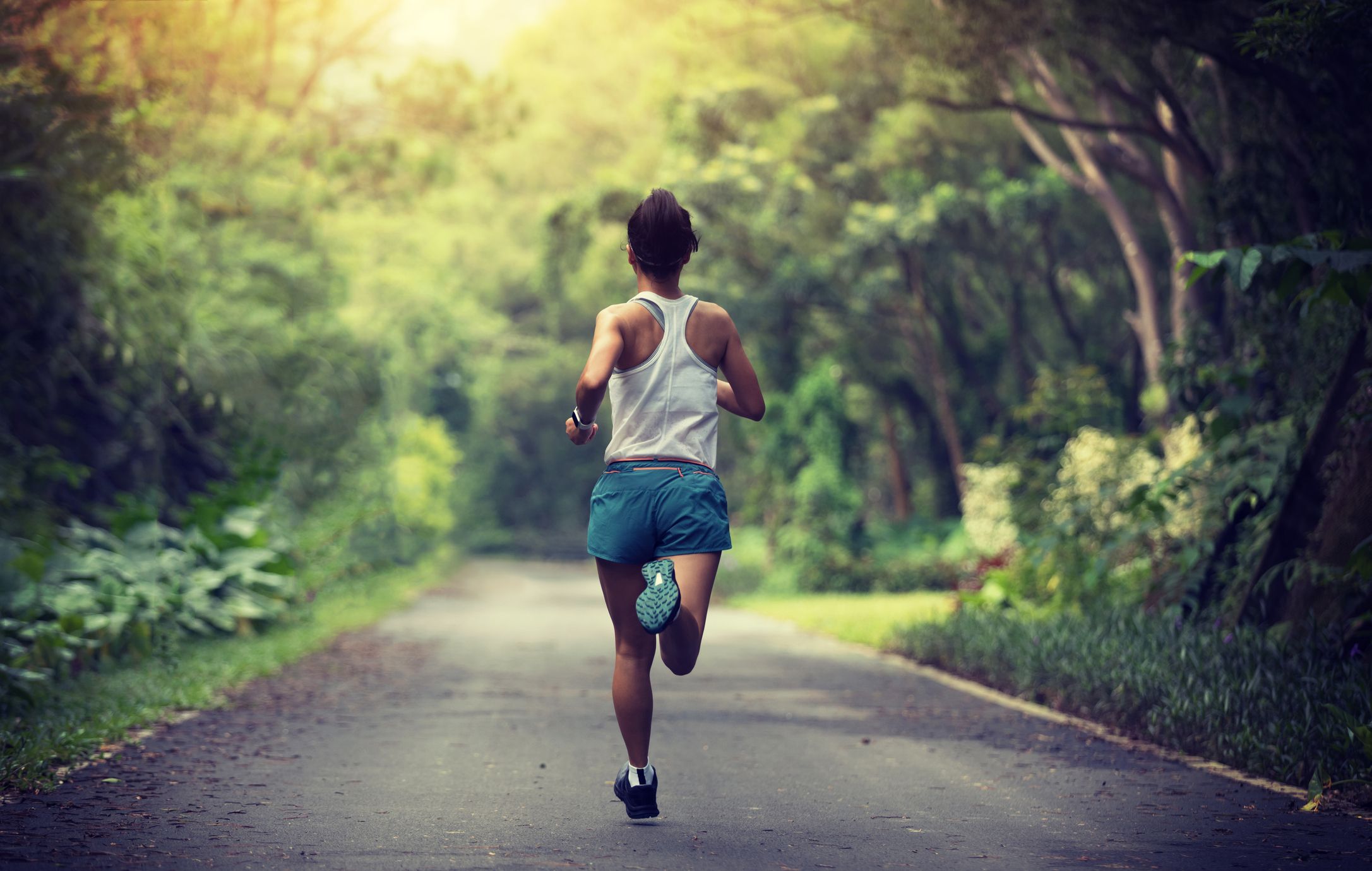 female-runner-running-at-summer-park-trail-healthy-royalty-free-image-1591373138.jpg